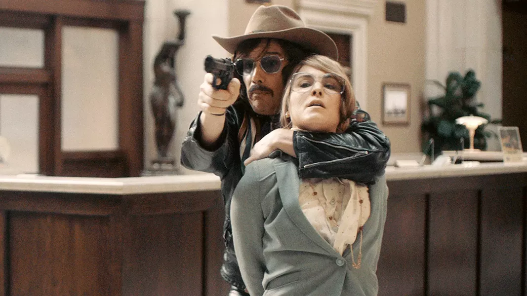 SYNDROME Ex-con and bank robber Lars Nystrom (Ethan Hawke) begins to develop a relationship with bank employee Bianca Lind (Noomi Repace), in Stockholm. - PHOTO COURTESY OF DARIUS FILMS
