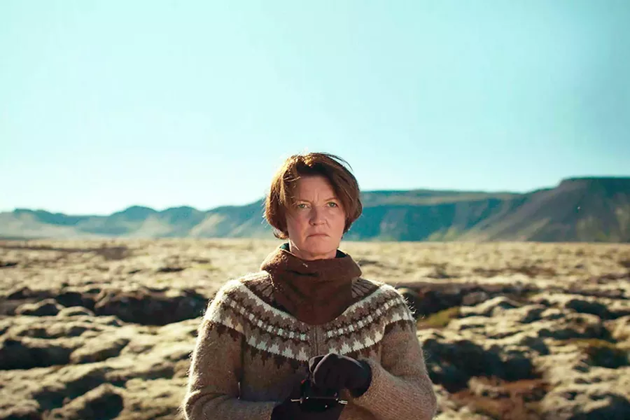 ECO-TERRORIST Environmental activist, Halla (Halldóra Geirharðsdóttir), has second thoughts about her crusade against the Icelandic aluminum industry when her long-forgotten application to adopt an orphan child from Ukraine gets approved, in Woman at War. - PHOTO COURTESY OF VILLAGE PICTURES
