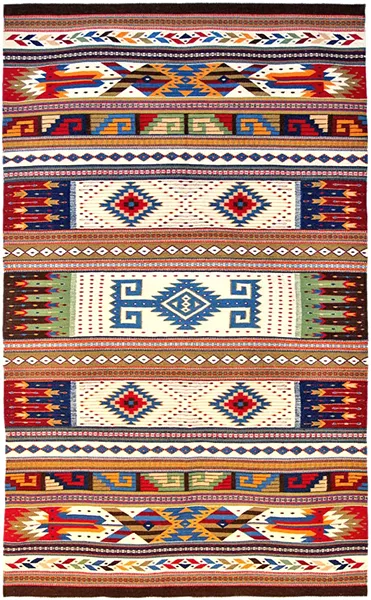 THE LINE Master Weaver Porfirio Gutiérrez takes inspiration from both his upbringing as part of the Zapotec culture in Oaxaca, Mexico, and his life in America in pieces like Door to the Spirit World. - IMAGES COURTESY OF PORFIRIO GUTIÉRREZ