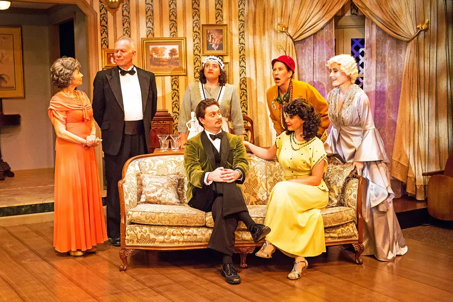 HAUNTED When a night of fun goes awry, the dead and the living must duke it out in Noël Coward's comic play, Blithe Spirit. From left to right: Mrs. Violet Bradman (Rosh Wright), Dr. George Bradman (Gary Paul-Clark), Edith (Kerry DiMaggio), Charles Condomine (Toby Tropper), Ruth Condomine (Rachel Tietz), Madame Arcati (Suzy Newman), and Elvira Condomine (Katie Worley-Beck). - PHOTOS COURTESY OF RYLO MEDIA DESIGN