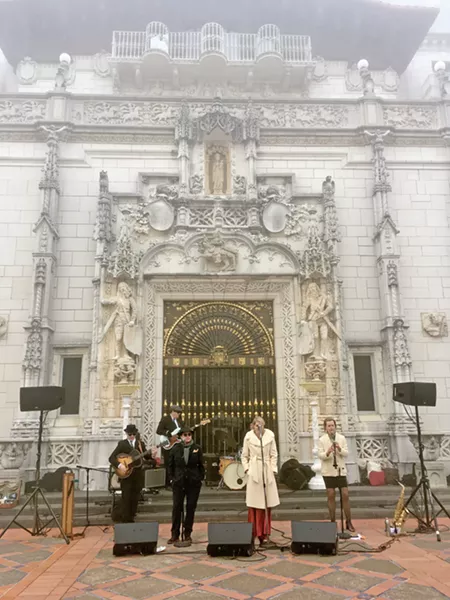 IN THE COLD The Tipsy Gypsies weathered the rain and fog with bluesy covers of songs by bands like Portishead. It's befitting of a late afternoon spent walking around a castle built in the 1920s. - PHOTOS BY CAMILLIA LANHAM