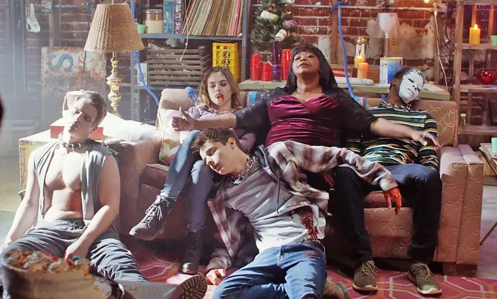 GET WEIRD A lonely woman (Octavia Spencer, seated center) meets some teens and lets them party in her basement, but she's soon taking advantage of them, in the horror-thriller, Ma. - PHOTO COURTESY OF BLUMHOUSE PRODUCTIONS
