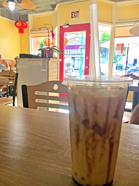 THIRSTY? Phơ 4 U makes organic tiger pearl milk tea, a chilled caramel cream jasmine tea drink with passion fruit tapioca pearls that's so good it's unreal. - PHOTOS BY BETH GIUFFRE