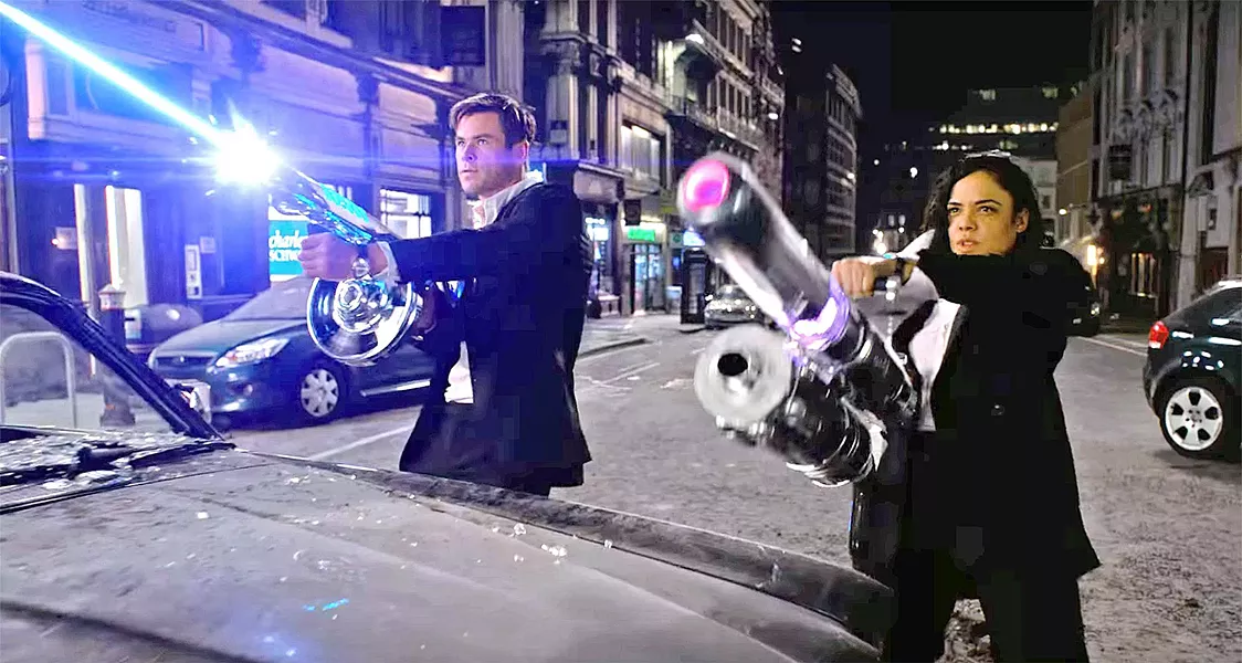 RUNNING ON EMPTY New recruit Agent M (Tessa Thompson, right) and Agent H (Chris Hemsworth) join forces to find an enemy mole in their organization, in the uninspired Men in Black: International. - PHOTO COURTESY OF COLUMBIA PICTURES