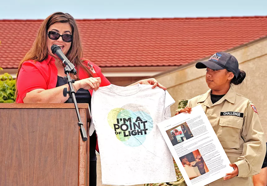 RECOGNIZED On June 11, Lesly Diaz (right), 17, a student at Grizzly Youth Academy, received the President's Gold Volunteer Service Award and National Daily Point of Light Award for her volunteer work helping animals in crisis. - PHOTO COURTESY OF JEFF BOWEN