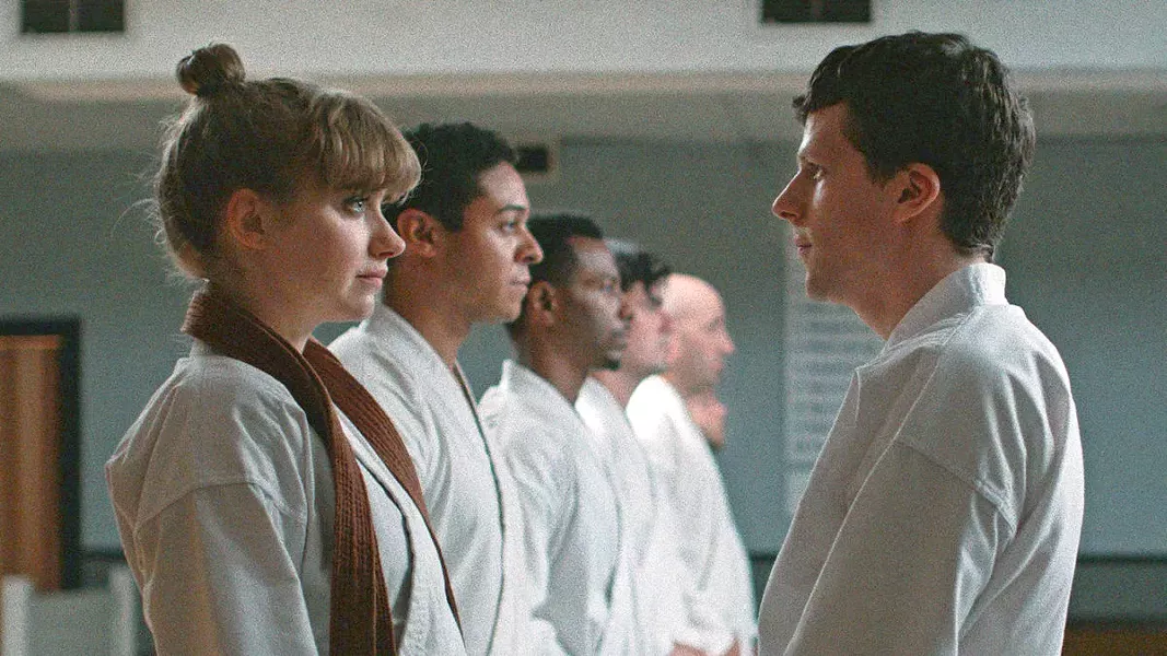 HIYA! After being randomly attacked, timid Casey (Jesse Eisenberg) decides to join a dojo and learn martial arts, leading him into a hyper-masculine underworld, in The Art of Self-Defense, screening exclusively at The Palm. - PHOTO COURTESY OF END CUE