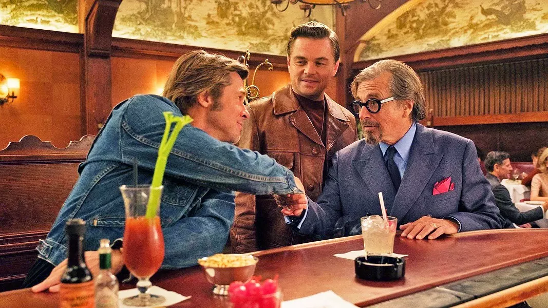 GOLDEN HOLLYWOOD Cliff Booth (Brad Pitt, left), TV star Rick Dalton's (Leonardo DiCaprio, center) stunt double, meets producer Marvin Schwarzs (Al Pacino, right), in Quentin Tarantino's ninth film, Once Upon a Time ... in Hollywood. - PHOTO COURTESY OF SONY PICTURES ENTERTAINMENT