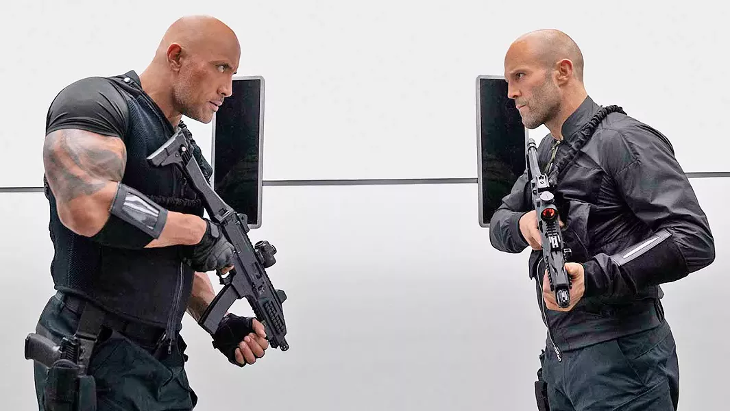 TEAM WORK Lawman Luke Hobbs (Dwayne Johnson, left) teams up with outcast Deckard Shaw (Jason Statham) to stop a genetically enhanced villain, in Fast & Furious Presents: Hobbs & Shaw. - PHOTO COURTESY OF UNIVERSAL PICTURES