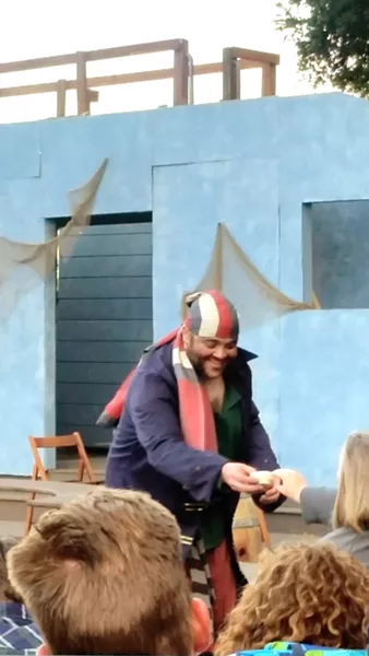 THANKS, MATEY! Before the Shakespeare Festival's Treasure Island begins, a swarthy pirate wanders the audience looking for loot. - PHOTOS BY ANDREA ROOKS