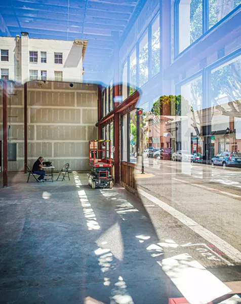 ALWAYS CHANGING Two large shops at 959 Higuera St., formerly home to Bali's Self Serve Frozen Yogurt and Cal Poly Downtown, have been vacated and are undergoing renovations. - PHOTO BY JAYSON MELLOM