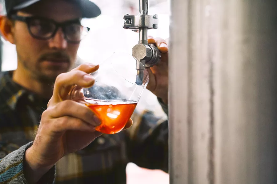 INDY WINE Firestone Walker Brewmaster Matt Brynildson's idea was to use subtle souring techniques to create an acid profile similar to rosé wine, co-fermenting light pilsner/white wheat malts and traditional hops wort with the wine grape juice to make beer and wine simultaneously. During the whirlpool phase, Brynildson and his team incorporated a generous dose of hibiscus flowers for rose petal aromas and a touch of natural citric acid. - PHOTO COURTESY OF FIRESTONE WALKER