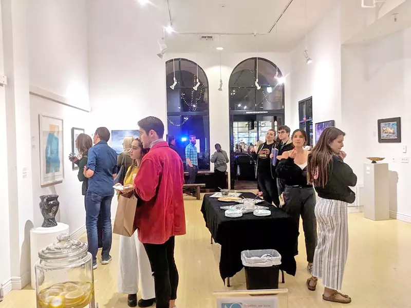 OPENING NIGHT Along with coordinating the two weekends of the Open Studios Art Tour, ARTS Obispo opened a temporary gallery to highlights some of the tour's artists. Community members enjoy the Oct. 5 gallery opening night. - PHOTOS COURTESY OF EDEL MITCHELL
