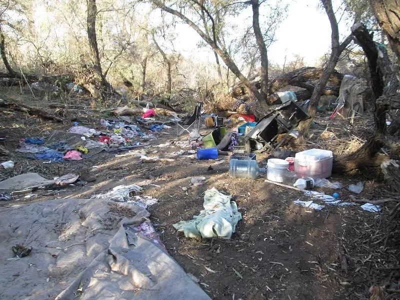 HEALTH CONCERNS An Oct. 3 workshop hosted by the Central Coast Regional Water Quality Control Board explored the troubling relationship between homelessness and water. Water officials say they're concerned about how riverbed homeless camps (pictured here at the Salinas River near Paso Robles) are impacting watersheds. - PHOTO COURTESY OF THE CITY OF PASO ROBLES