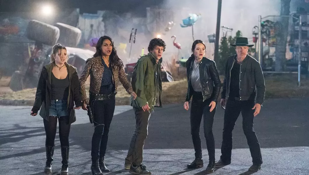 TEAM WORK (Left to right) Little Rock (Abigail Breslin), Nevada (Rosario Dawson), Columbus (Jesse Eisenberg), Wichita (Emma Stone), and Tallahassee (Woody Harrelson) face off against a zombie horde. - PHOTOS COURTESY OF COLUMBIA PICTURES