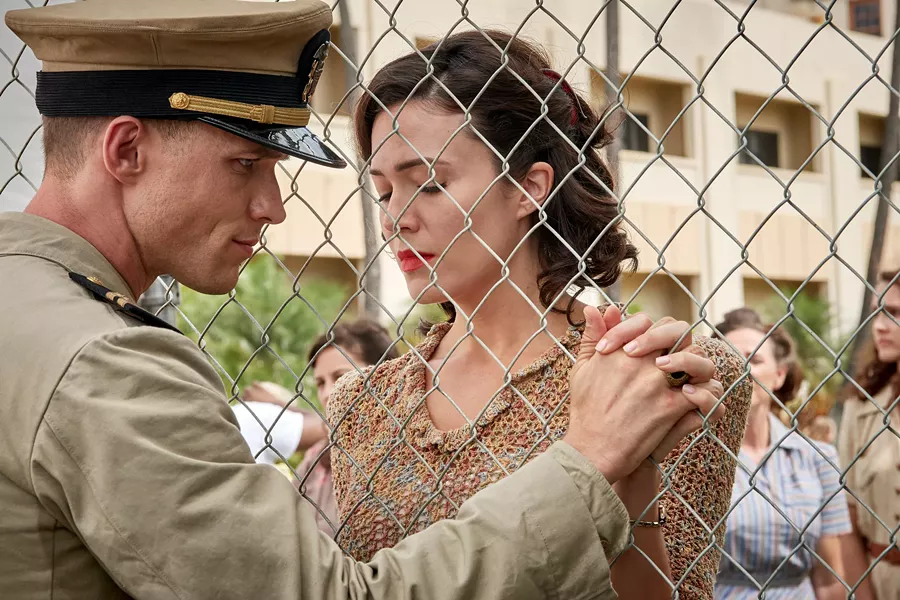 CASUALTIES OF WAR Lt. Richard "Dick" Best (Ed Skrein) and his wife, Anne (Mandy Moore), share a quiet moment before Dick engages in the World War II-era Battle of Midway, which turned the tide in the Pacific Theater, in Midway. - PHOTO COURTESY OF AGC STUDIOS