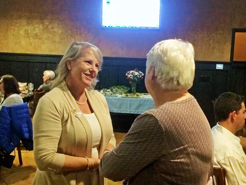 MORE MONEY MORE PROBLEMS Mayor Caren Ray Russom greets a supporter at an election night party in 2018. Now Russom is fighting for a pay increase for Arroyo Grande City Council. - FILE PHOTO BY CHRIS MCGUINNESS