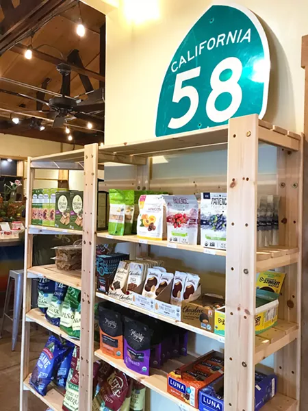 DELICIOUS AND NUTRITIOUS Caliwala's wood shelves are neatly stocked with organic and paleo staples. - PHOTOS BY BETH GIUFFRE