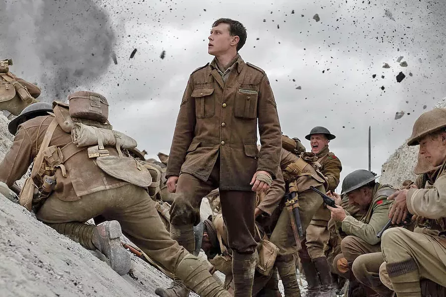 ESSENTIAL MISSION Lance Cpl. Schofield (George MacKay, center) traverses a hellscape in his effort to deliver a message to stop a regiment of his fellow soldiers from charging into a trap. - PHOTOS COURTESY OF DREAMWORKS