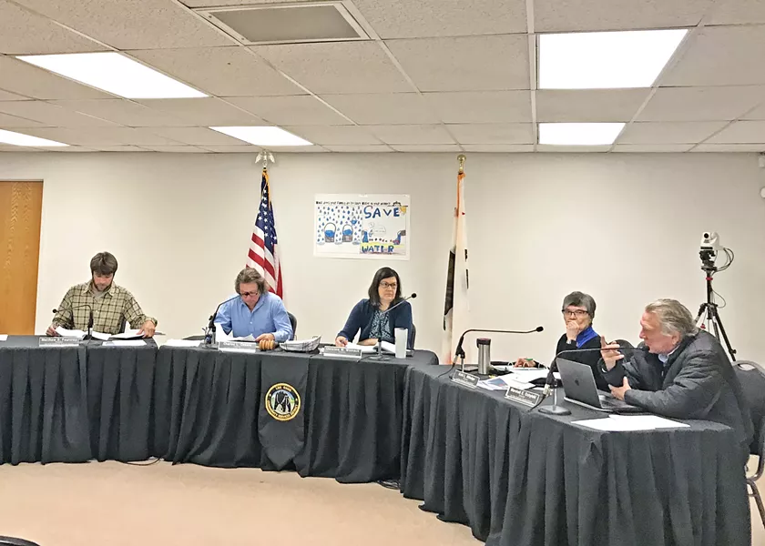 FLUMMOXED The Los Osos CSD board on Feb. 6 deliberated two more cases of extremely high water bills that were appealed to the district. - PHOTO BY PETER JOHNSON
