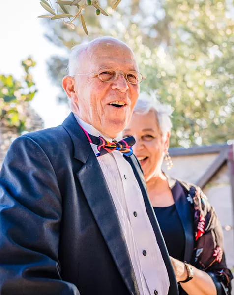 YIN AND YANG Philip and Joanne Ruggles smile at their surprise 50th wedding anniversary party in August 2018. Phil died a little more than a year later, after having an aortic dissection, a highly fatal event that couldn't be properly treated because he was on a blood thinner. - PHOTO COURTESY OF BLAKE ANDREWS