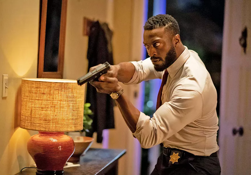 BELIEVE OR DIE Detective James Lanier (Aldis Hodge) finally realizes his childhood friend Cecilia really is being tormented by an invisible entity. - PHOTOS COURTESY OF BLUMHOUSE PRODUCTIONS