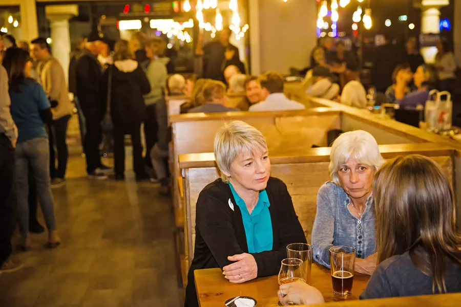 TOUGH NIGHT Ellen Beraud talks with supporters at Wild Fields Brewhouse on March 3. She trailed 5th District SLO County Supervisor Debbie Arnold by 14 percentage points after election night. - PHOTO BY JAYSON MELLOM