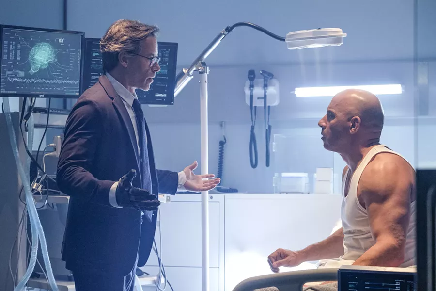 MANIPULATOR Dr. Emil Harting (Guy Pearce, left) resurrects slain soldier Ray Garrison (Vin Diesel) and sexnds him on a series of assassinations under the guise that Garrison is avenging his murdered wife. - PHOTO COURTESY OF SONY PICTURES ENTERTAINMENT