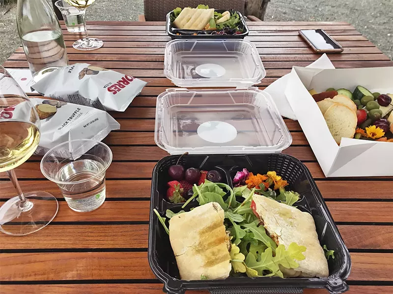 LUNCH AT TOLOSA At Tolosa Winery in Edna Valley, a recent meal by LouLou Cheese Girl includes sandwiches and a cheese box out the picturesque terrace. - PHOTOS BY BETH GIUFFRE