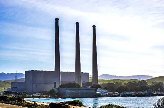 DEMOLITION DESTINY Whether people like it or not, the stacks are coming down: Morro Bay City Council handed over their fate to Vistra earlier this year. - PHOTO COURTESY OF VISTRA