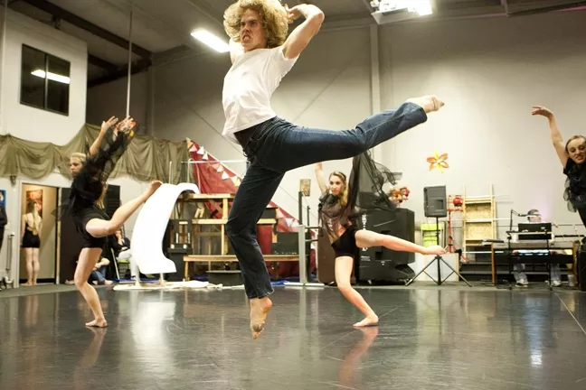 HELTER SKELTER : Jude, danced by Michael Scribner, faces his demons in a piece choreographed to the Beatles’ “Helter Skelter,” in Let it Be. - PHOTO BY STEVE E. MILLER