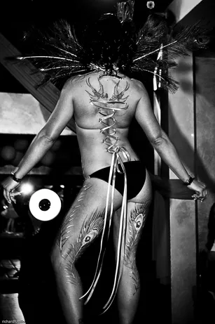 FIT TO BE TIED : A model at last year’s Embodiment series at Native Lounge features body paint, feathers, piercings, ribbon, and a teeny, tiny bikini. The new series runs four consecutive Thursdays beginning Jan. 28. - PHOTOS BY RICHARD FUSILLO