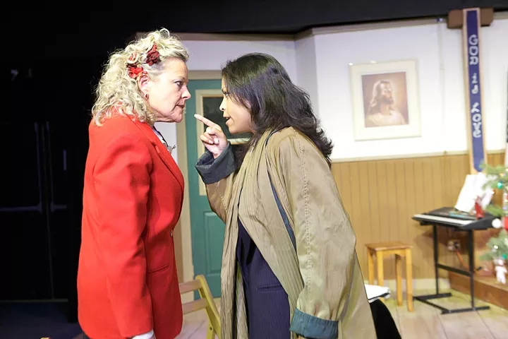 CUTLINE : Susie Fulton and Jo Mani sling accusations of racism and ungratefulness as Darlene Parsons and Sharon Johnson in SLO Little Theatre’s production of Daughters of the Lone Star State. - PHOTO BY STEVE E. MILLER