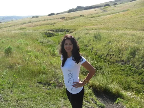 THE WOMAN WITH THE PLAN : Cal Poly student Melissa Soroushian, here modeling an ECOSLO T-shirt, put on the fashion show for her senior project, with proceeds benefiting ECOSLO. - PHOTO COURTESY OF MELISSA SOROUSHIAN