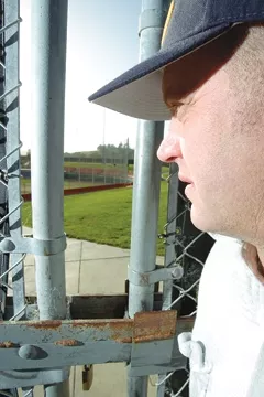 GOLDEN ERA GONE : Tim Golden looks through the locked gate at Sinsheimer Stadium, where the Blues have played for more than a decade. - PHOTO BY STEVE E MILLER