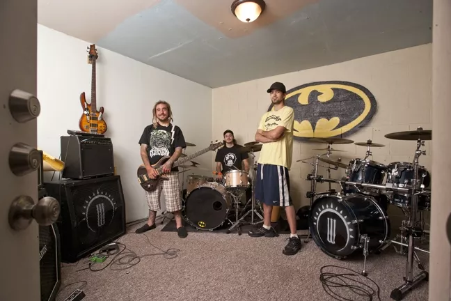 ROOM GALORE : Wes Price, Billy Gerhardt, and Nathan Jones (left to right), owners of the Sauce Pot rehearsal spaces, showcase the size of the rooms they have for musicians to rent. - PHOTO BY STEVE E. MILLER