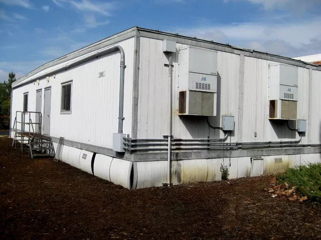 PORTABLE PROBLEMS: Cuesta’s portable buildings are one of the major reasons administrators hope Measure L passes. Due to a state education code, the portables all need to be retired in September 2015, which means more than 60,000 square feet of classrooms and offices need to be replaced in less than a year. - PHOTO COURTESY OF THE CUESTA MAINTENANCE TEAM