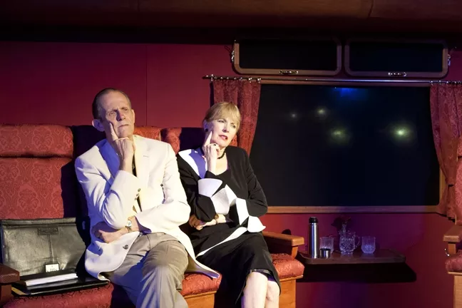 DESTINATON UNKNOWN: Parsky (Michael Siebrass) and Martha (Gailee Walker Wells) are on a train bound for Frankfurt, but it is their mental trajectory that interests the audience. - PHOTO BY STEVE E. MILLER