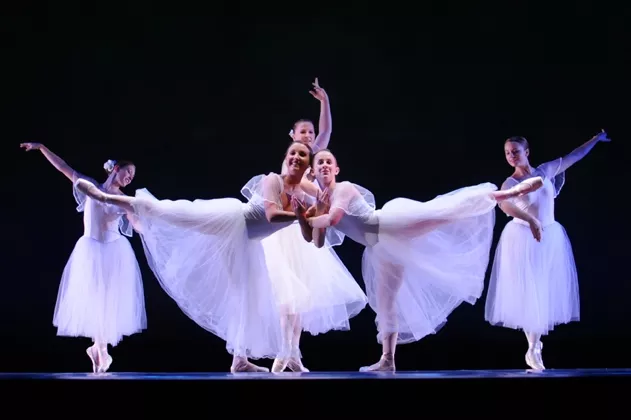 NEAR-SYMMETRY : It’s Orchesis’ 41st year, and Stanton and Co. are trying a few new things, like incorporating film into dance. Pictured are some dancers from the company. - PHOTO BY KIEL CARREAU