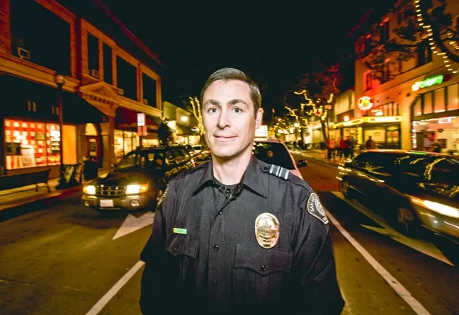 ON THE DRUNKEN TRAIL: Officer Tim Koznek (pictured) was assigned as a DUI enforcement officer after the SLOPD created the position last November. - PHOTO BY HENRY BRUINGTON