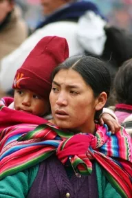 RED HEAD : Photographer Janna Nichols shot this image of a woman and child on a 2005 trip to Huilloc, Peru. - PHOTO BY JANNA NICHOLS