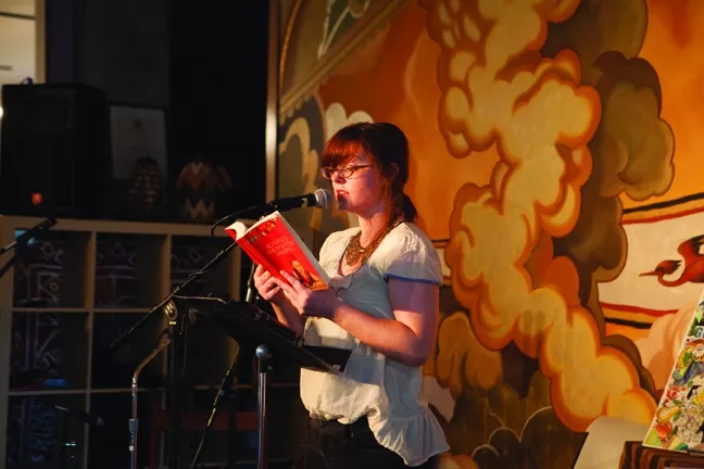 ALMOST POETRY: New Times managing editor Ashley Schwellenbach read a passage from her debut young adult novel Scourge of the Righteous Haddock. - PHOTO BY COLIN RIGLEY