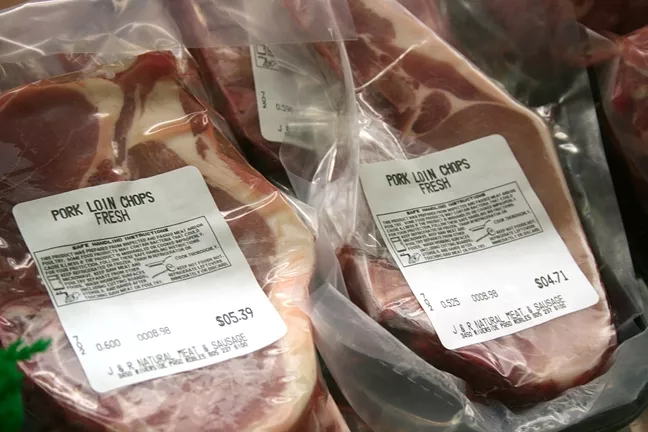 PORK PRODUCTS GALORE : A range of unique locally-sourced pork cuts—including uncured pork belly bacon—is on sale at J&R Meats locations in Paso Robles and Templeton. - PHOTO BY REID CAIN