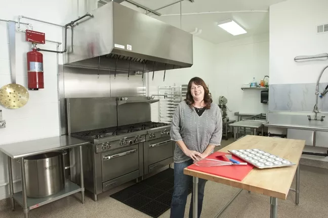 WHAT’S COOKING? : Laura Kramer built her dream kitchen to can her own green tomato relish, but now the Paso Robles cooking space is available for anyone to rent by calling Kramer at 238-0083. - PHOTO BY STEVE E. MILLER