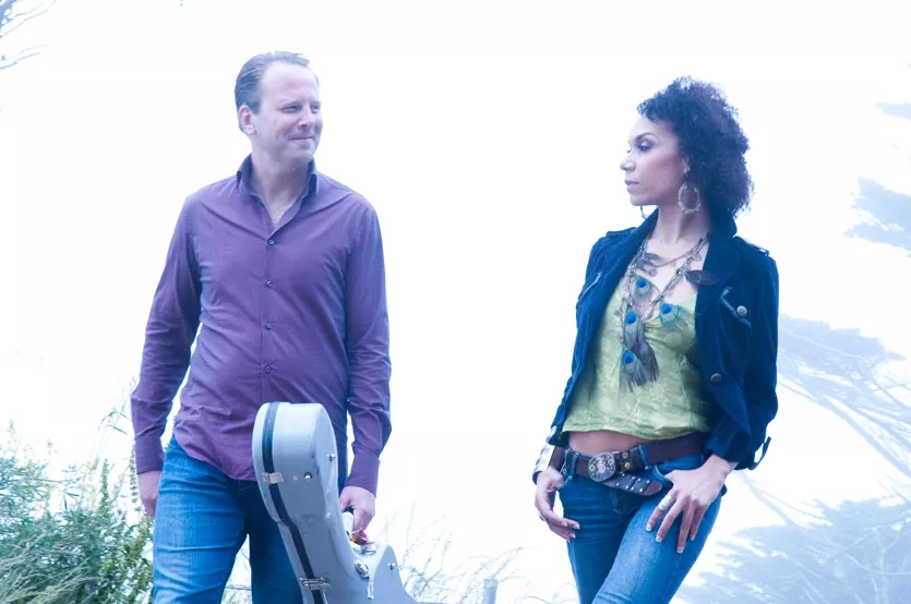 PERFECT PAIRING : Acoustic self-taught guitar wiz Brian Gore and stunning vocalist Scheherazade Stone—known together as The Sing Strings—will present an evening of folk, jazz, and classical music at Coalesce on Oct. 23. - PHOTO COURTESY OF BRIAN GORE AND SCHEHERAZADE STONE