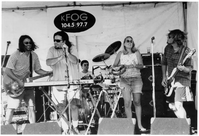 REMEMBERING MARK : (Left to right) Mark Kafoury, Doug Groshart, Dave Walker, Helen Tracewell-Guzzi, and Jon Scholl were part of the hot local act Itchy McGuirk, which has reunited sans Mark, who died last year, for a fundraiser on Aug. 21 at Avila Beach Resort. - PHOTO COURTESY OF ITCHY MCGUIRK