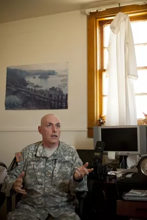 WARZONE GURU : With “more degrees than a rectal thermometer,” Chaplain Timothy Meier combines neural chemistry, psychology, and spirituality to teach soldiers how to remain emotionally resilient on the battlefield. - PHOTO BY STEVE E. MILLER