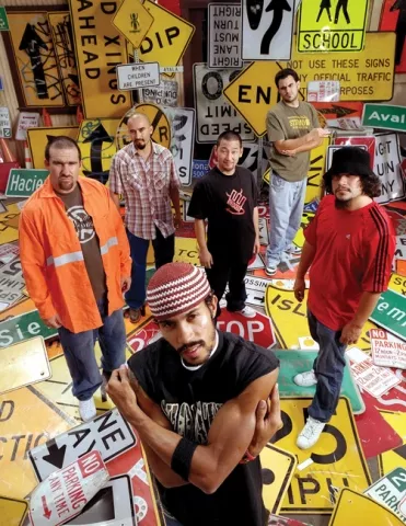 SIGN OF THE TIMES : Ozomatli--pioneer of Spanish-English mash-ups of hip hop, salsa, cumbia, dub, and Middle Eastern funk--plays Nov. 11 at the SLO Vets Hall. - PHOTO COURTESY OF OZOMATLI