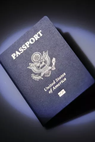 TRAVELS WITH UNCLE SAM : An emblem beneath the words "United States of America" indicates that this passport, issued this past winter, contains RFID technology. - PHOTO BY STEVE E. MILLER