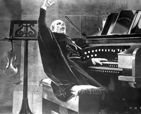 SETTING THE BAR FOR CREEPY : Lon Chaney is the phantom in the 1925 film version of Phantom of the Opera. - PHOTO COURTESY OF SLOIFF