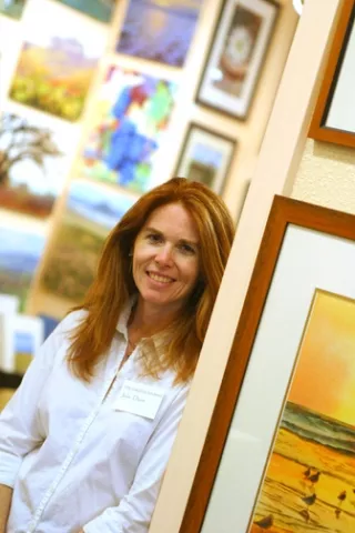 WOMAN WITH A PLAN: Julie Dun one of three owners of The Gallery in the Network rents display space to other artists to keep the gallery afloat